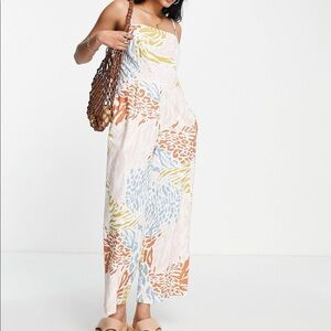 ASOS DESIGN button open back minimalist jumpsuit in marble print, size US 14